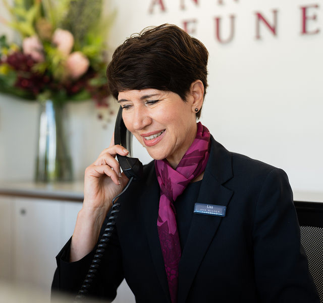 funeral director serving food and drinks